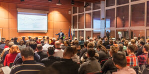 Business speaker giving a talk in the conference hall